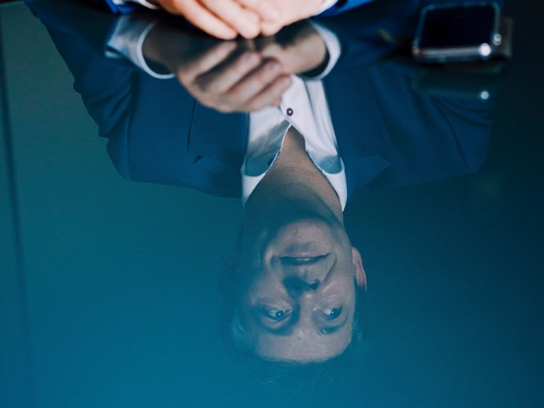 Roel Dumont, Managing Director of EOS Aremas, sitting at a desk.