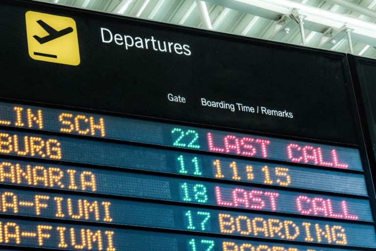 International debt purchasing: For NPL specialist Karel Smerak, the day often begins at the airport. International debt purchasing: A departures board at the airport.